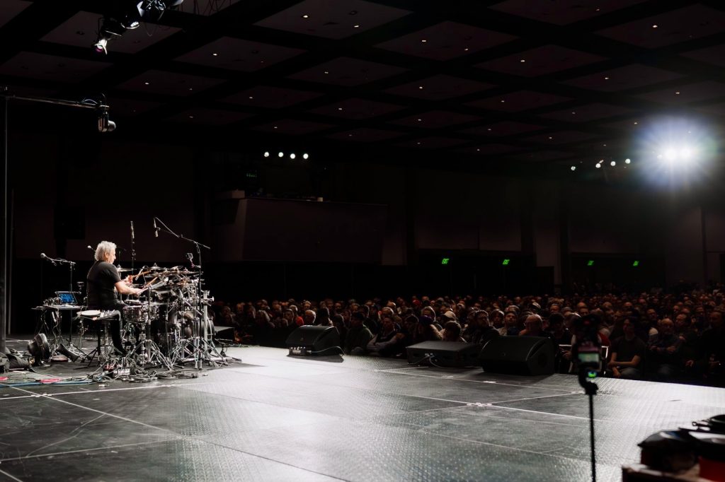 Dave Weckl's clinic at PASIC50 - Weckl faces the large crowd onstage at the drumset