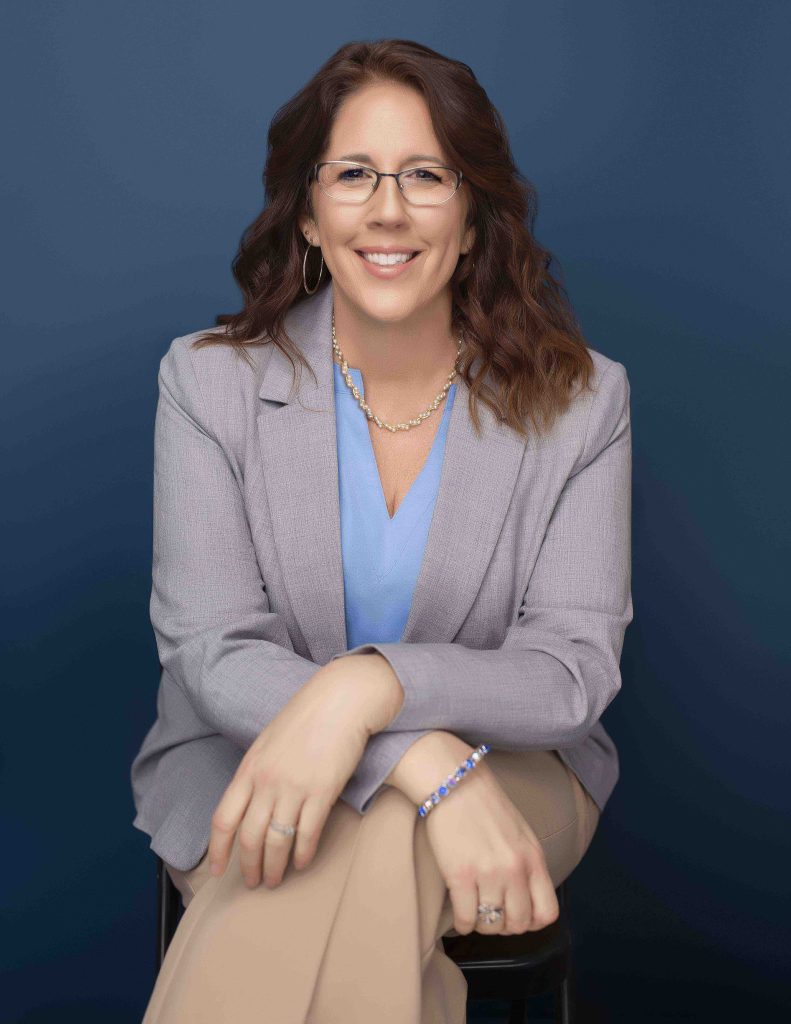 Professional headshot of Julia Gaines-Montag