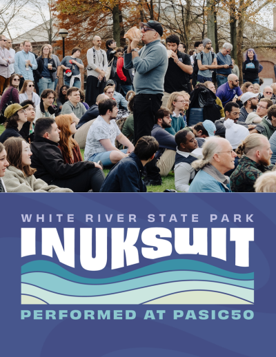 Man blowing conch shell in crowd with Inuksuit at White River State Park - Performed at PASIC50 Logo underneath